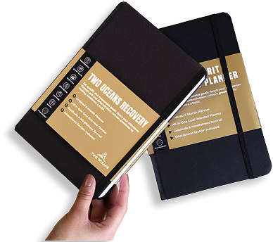 Alumni planner held in hand